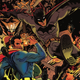 Superman, Batman, Wonder Woman, and Hawkgirl crowd together as a fire rages around them.